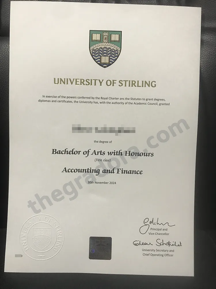 University of Stirling BA Accounting and Finance degree certificate with the graduate name obscured
